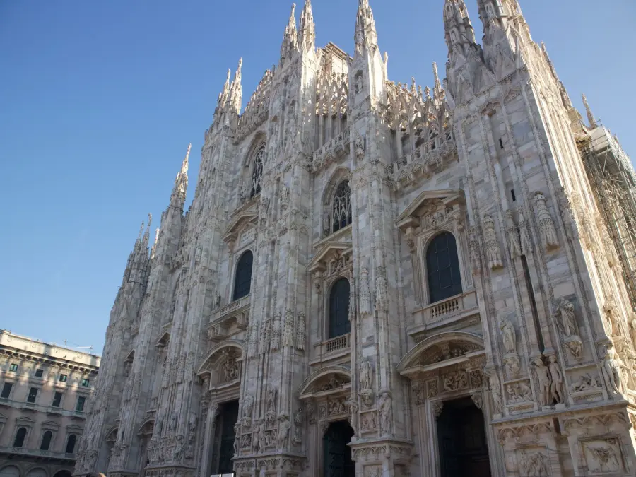 Explore the intricate Gothic facade of Milan's iconic cathedral, a masterpiece of Italian architecture.